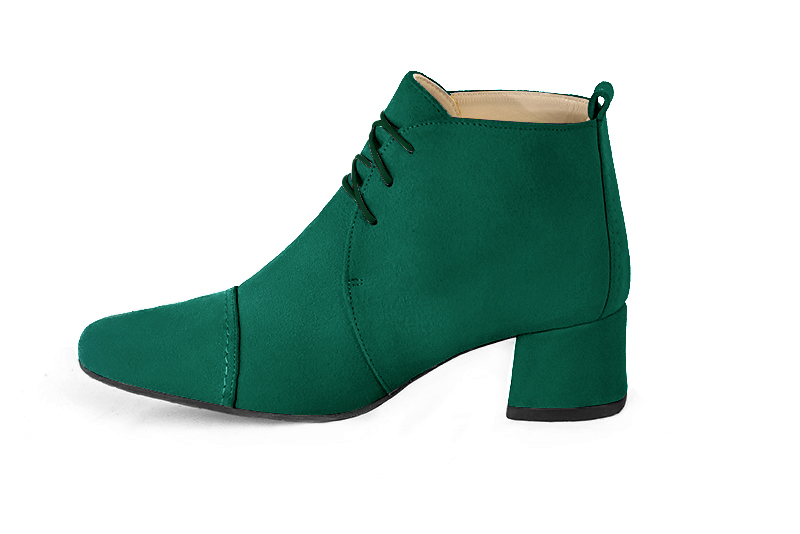 Emerald green women's ankle boots with laces at the front. Round toe. Low flare heels. Profile view - Florence KOOIJMAN